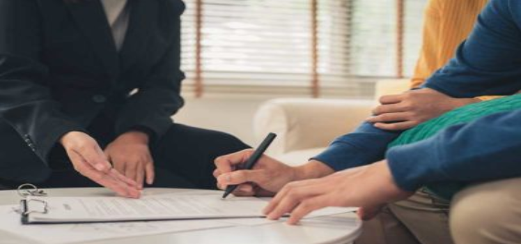 people signing a contract